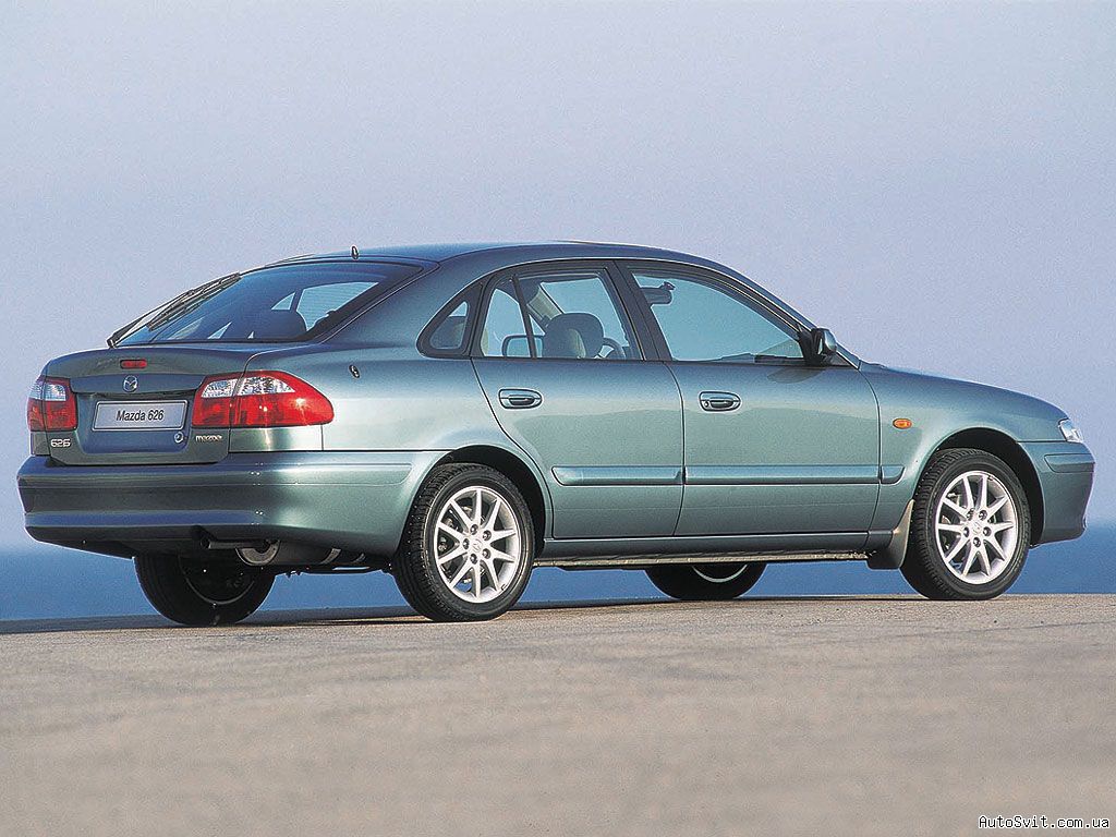 Mazda 3 1999 photo - 4