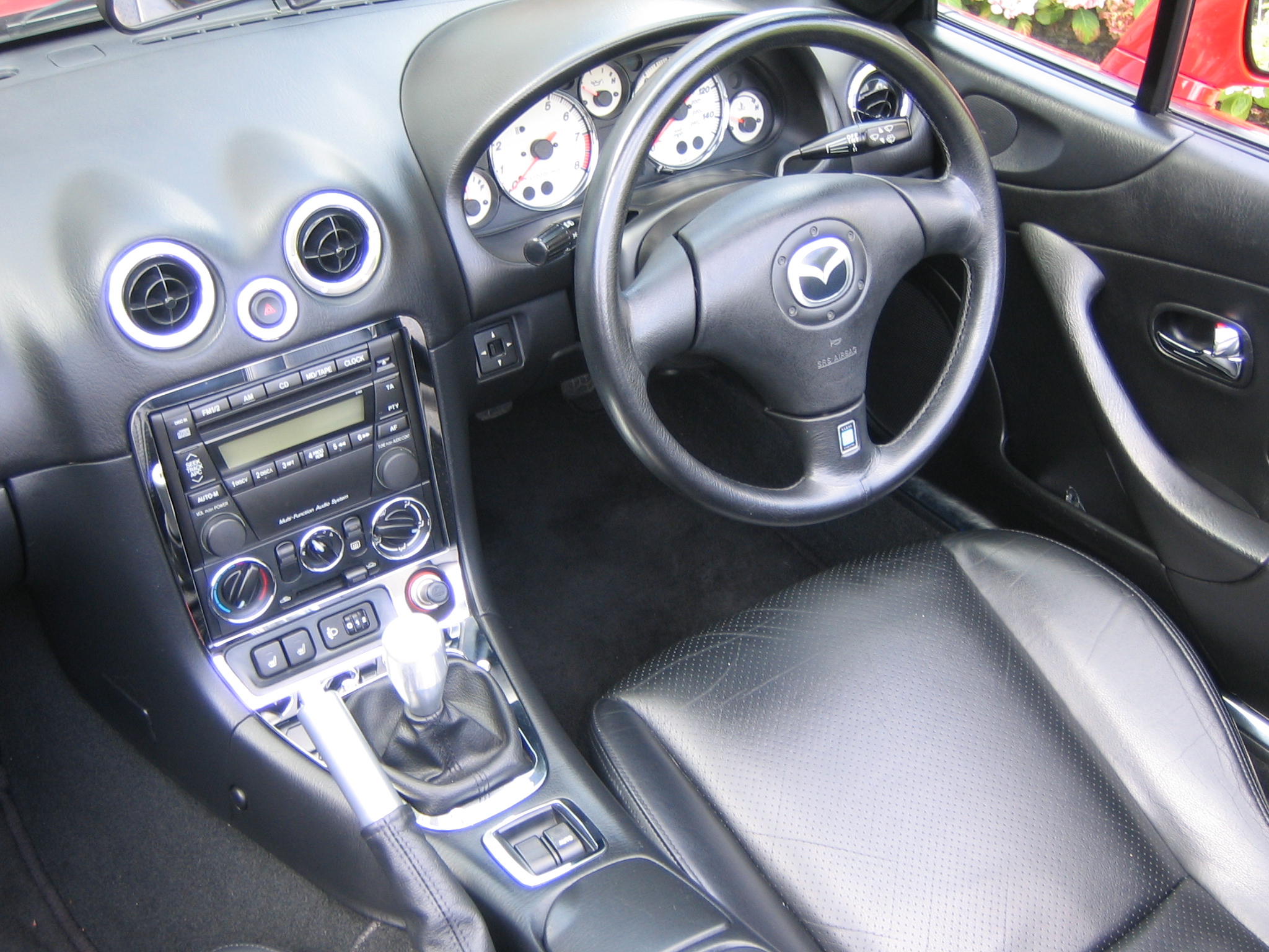 Black Mazda Astina 2004