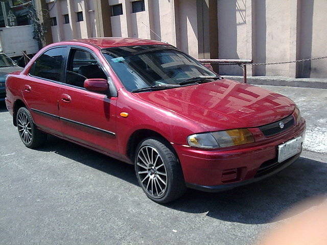 Black Mazda Familia 1998
