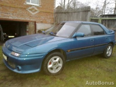 Blue Mazda 323 1992