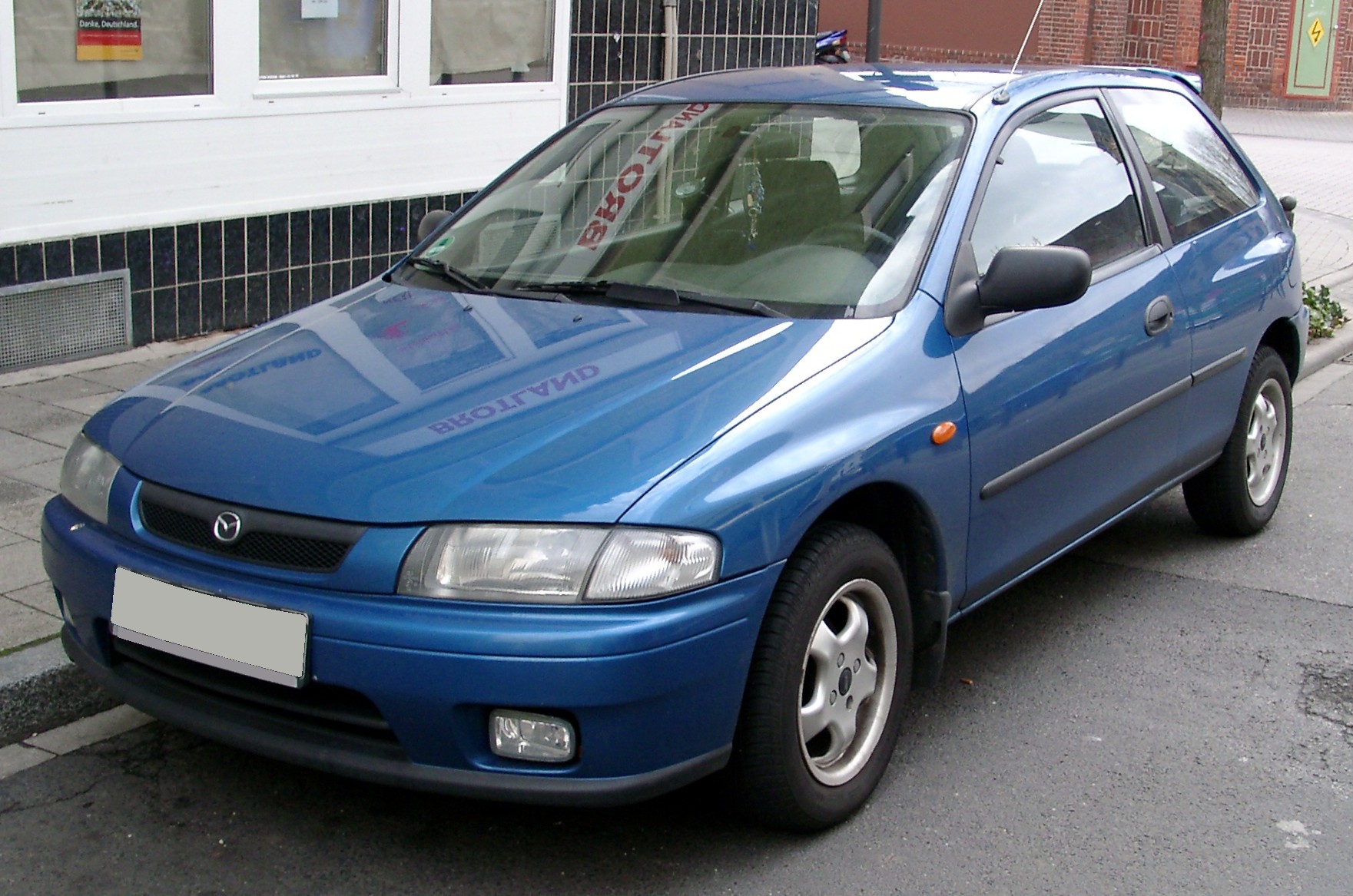 Blue Mazda 323F 1993