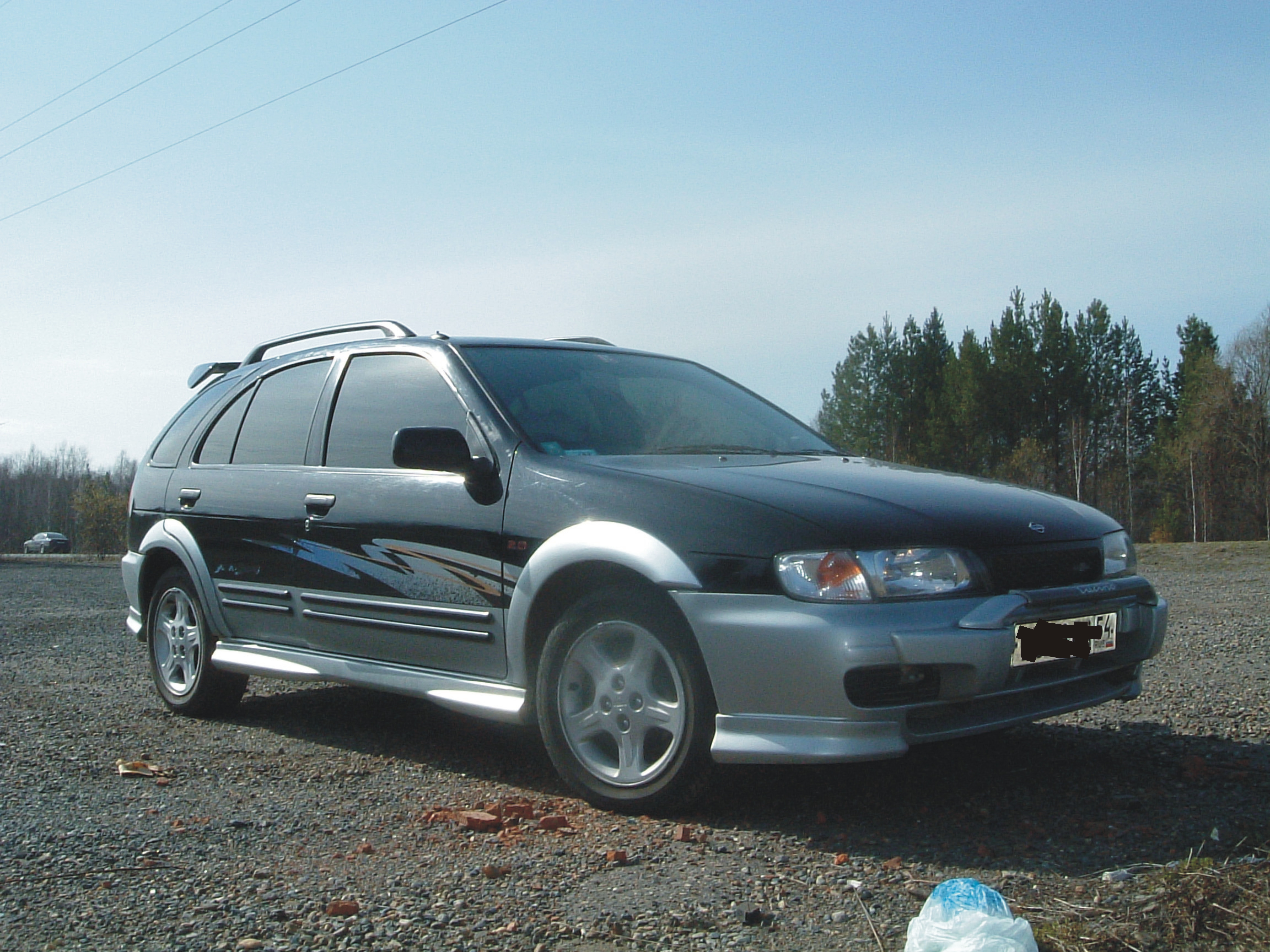 Nissan Lucino 1998 Photo - 1
