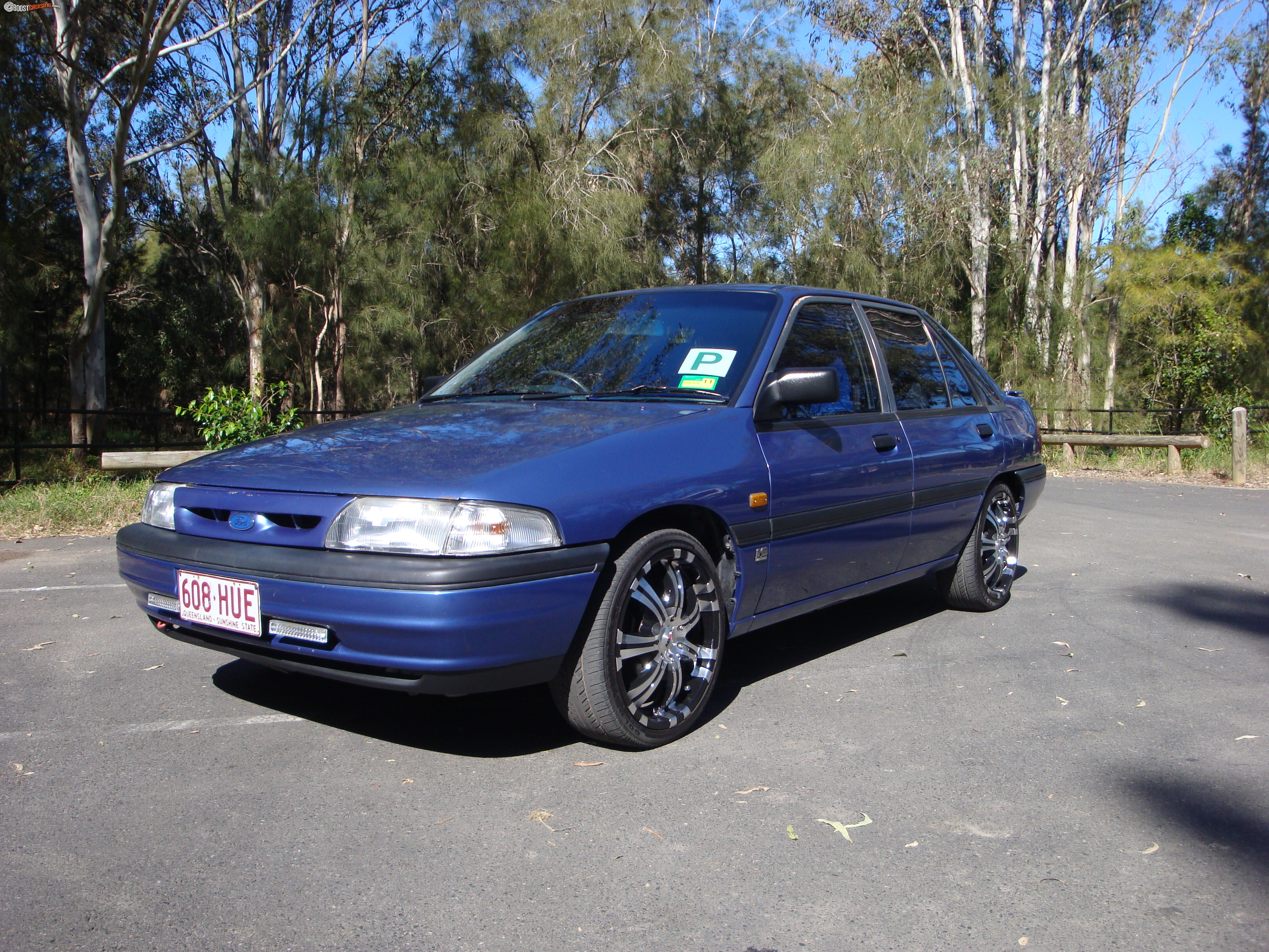 Ford Laser 1993 photo - 7