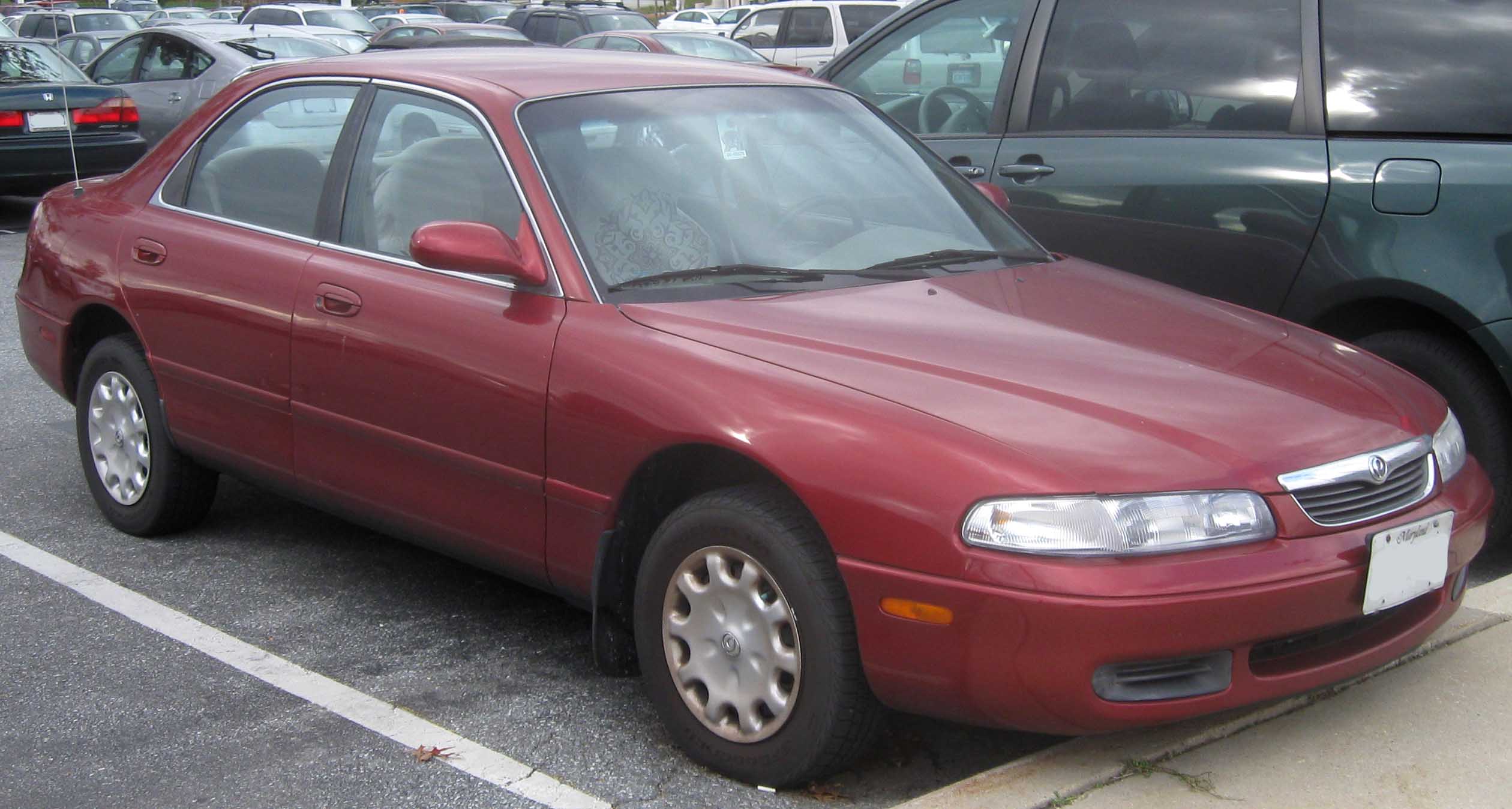 Mazda 3 1997 photo - 2